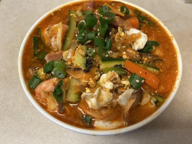 Kimchi soft tofu soup with shrimp and veggies