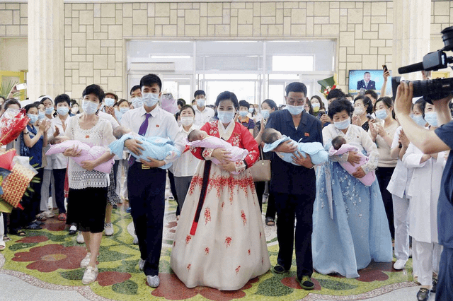 Quintuplets leaving the Pyongyang Maternity Hospital on June 19, after being born on Jan 31 in what is the first recorded case of quintuplets in the country