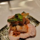 A different style bossam – green cabbage oyster kimchi with scallion cilantro chives and radish, with sous vide pork loin