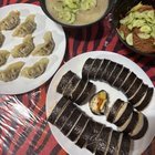 Tuna kimbap (참치김밥) bibim-naengmyeon (비빔냉면) mul-naengmyeon (물냉면) and kimchi dumplings (김치만두)