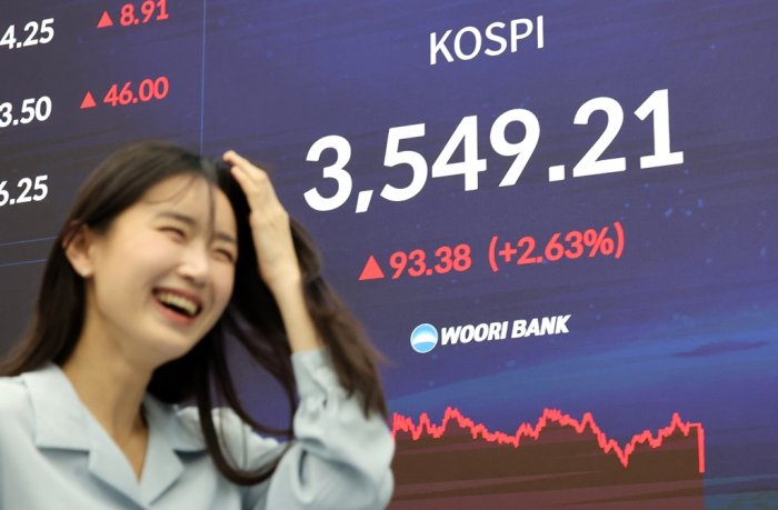 Korea Exchange to cut trading fees for 1st time in two decades as Kospi hits record high past 3,500