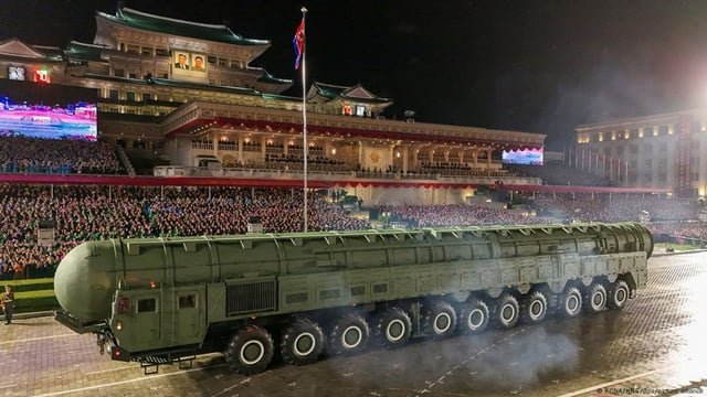 North Korea displays long-range missile at parade – DW