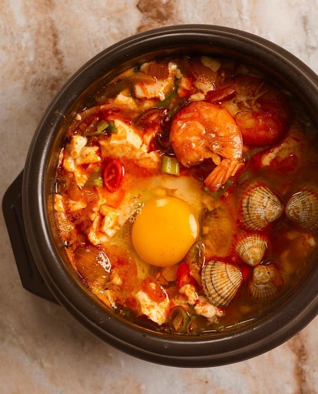 Seafood sundubu jjigae with clams & shrimp