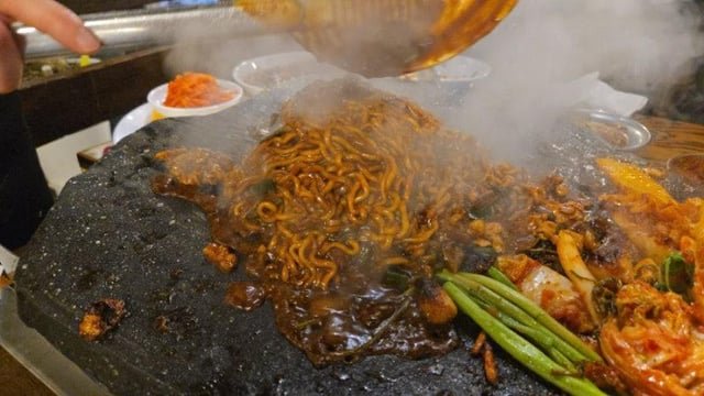 Jjapagetti on the stone grill instead of fried rice… and it’s genius.