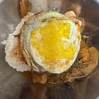 Pork kimchi jjigae and rice with fried egg on top