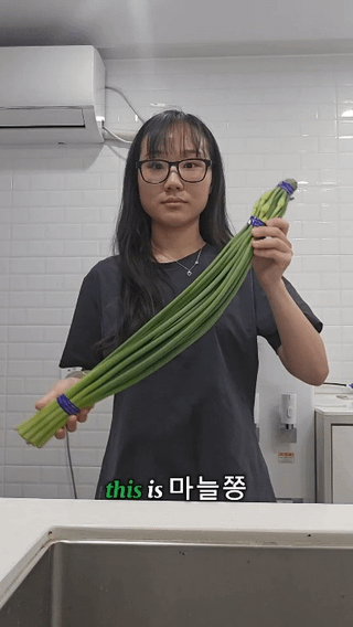 Adding garlic scapes to my Oiji