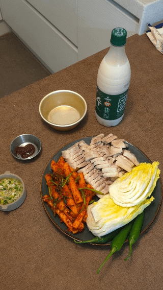 Homemade Bo-ssam (Pork Belly) with Water Parsley Radish Salad