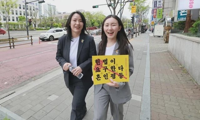 ‘A couple like any other’: Parents appeal to Korean court in lesbian couple’s fight for marriage equality