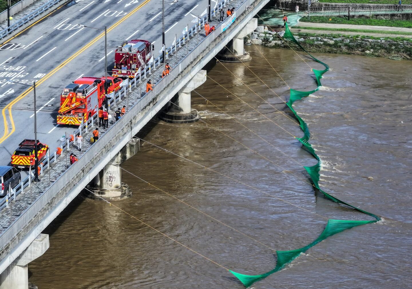 Search enters 3rd day for man swept away in torrent