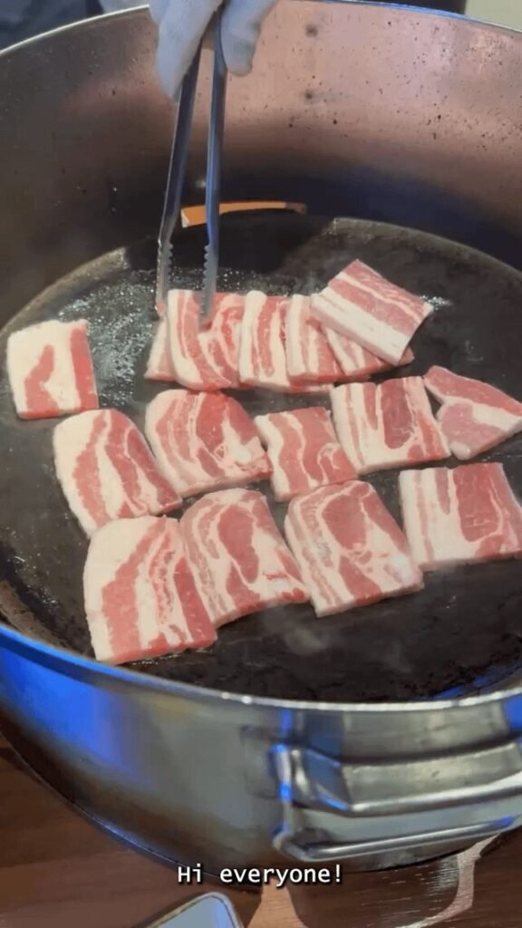 Iorn lid Korean-style grilled pork belly and kimchi