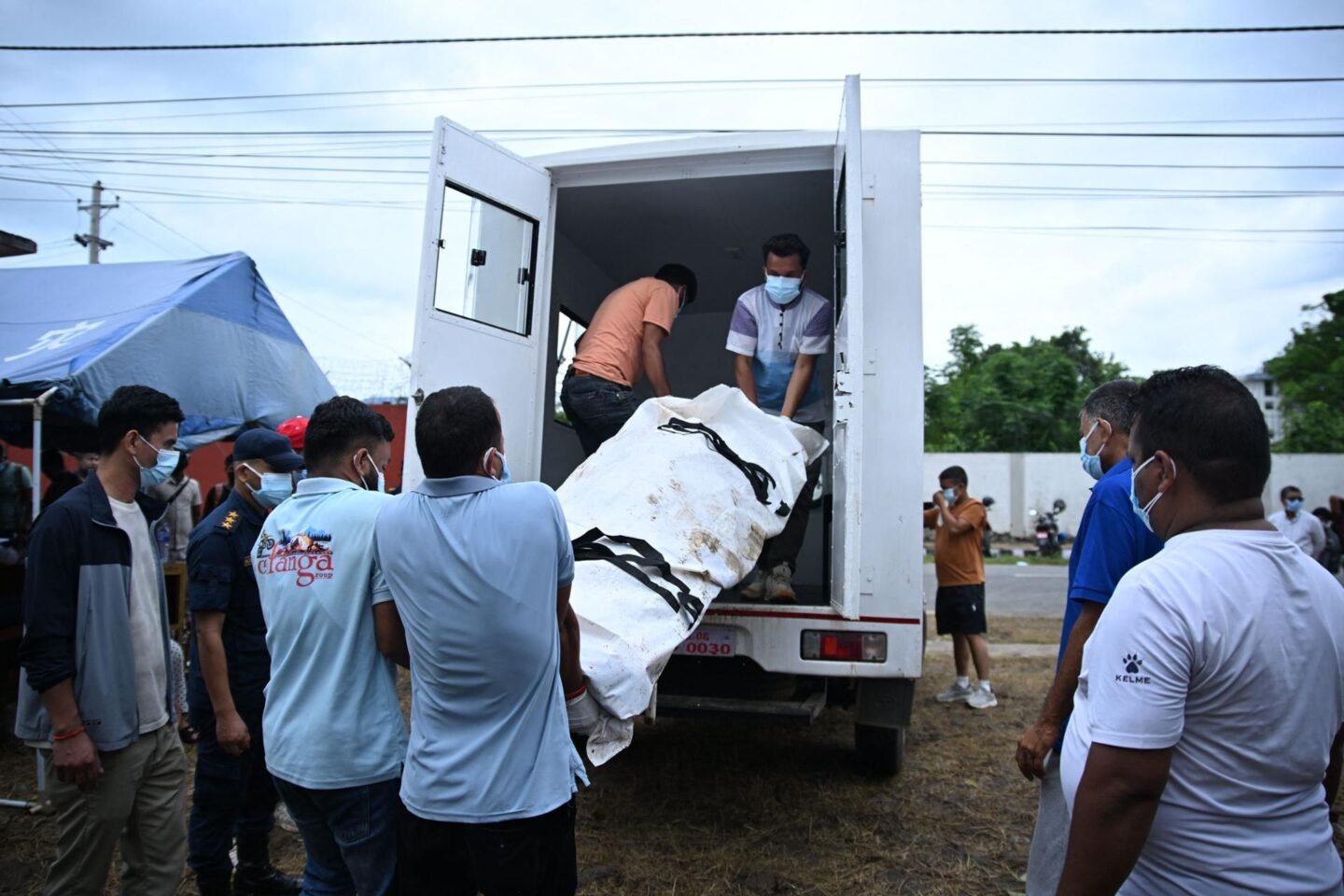 ‘Giant morgue’: Nepal flood victims overwhelm downstream city